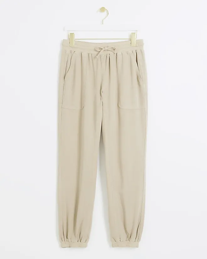 River Island Beige lyocell elasticated joggers Cream Hot