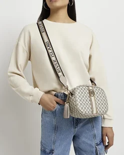 River Island Beige RI monogram print cross body bag Cream Hot