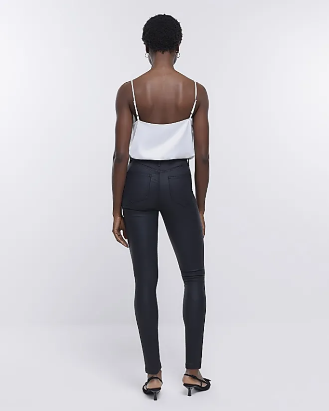 River Island coated denim high waisted skinny jeans Black Outlet