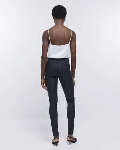 River Island coated denim high waisted skinny jeans Black Outlet
