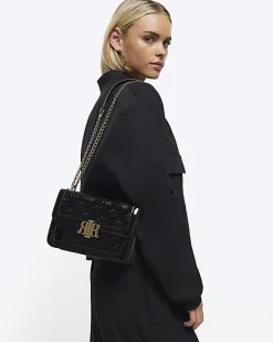 River Island embossed RI lock shoulder bag Black New