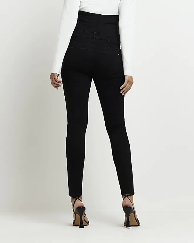 River Island Molly mid rise maternity skinny jeans Black Outlet