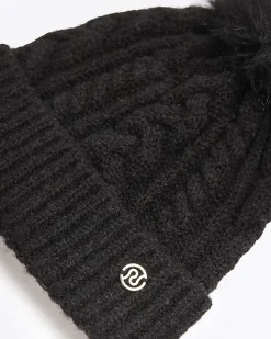 River Island pom pom cable knit beanie hat Black Sale