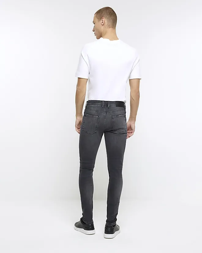 River Island spray on super skinny fit ripped jeans Black Fashion