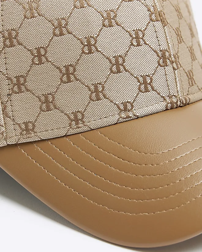 River Island RI monogram cap Brown Online