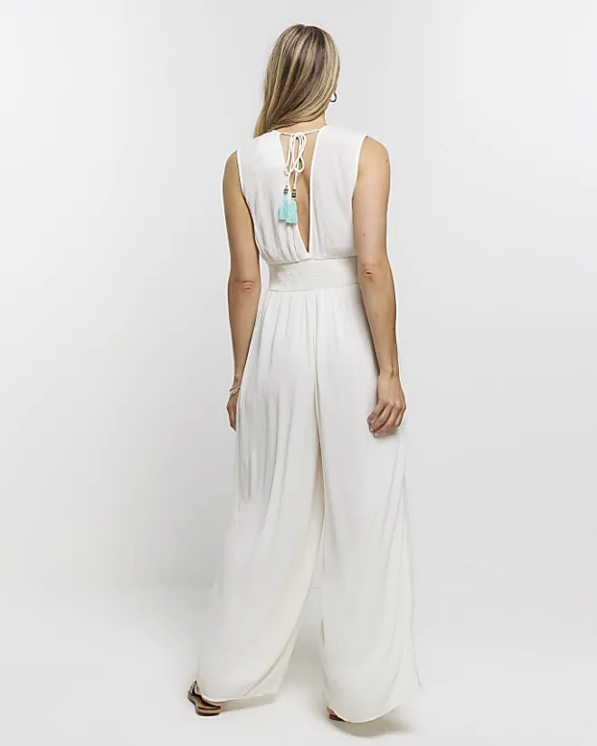 River Island embellished plunge jumpsuit Cream Outlet
