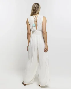 River Island embellished plunge jumpsuit Cream Outlet
