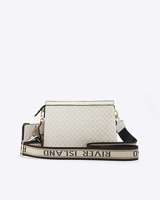 River Island embossed monogram cross body bag Cream Fashion