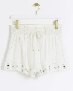 River Island metallic stripe beach shorts Cream Outlet