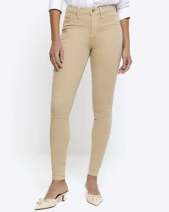 River Island mid rise bum sculpt jeggings Cream Best