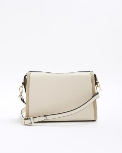 River Island RI monogram panel cross body bag Cream Sale