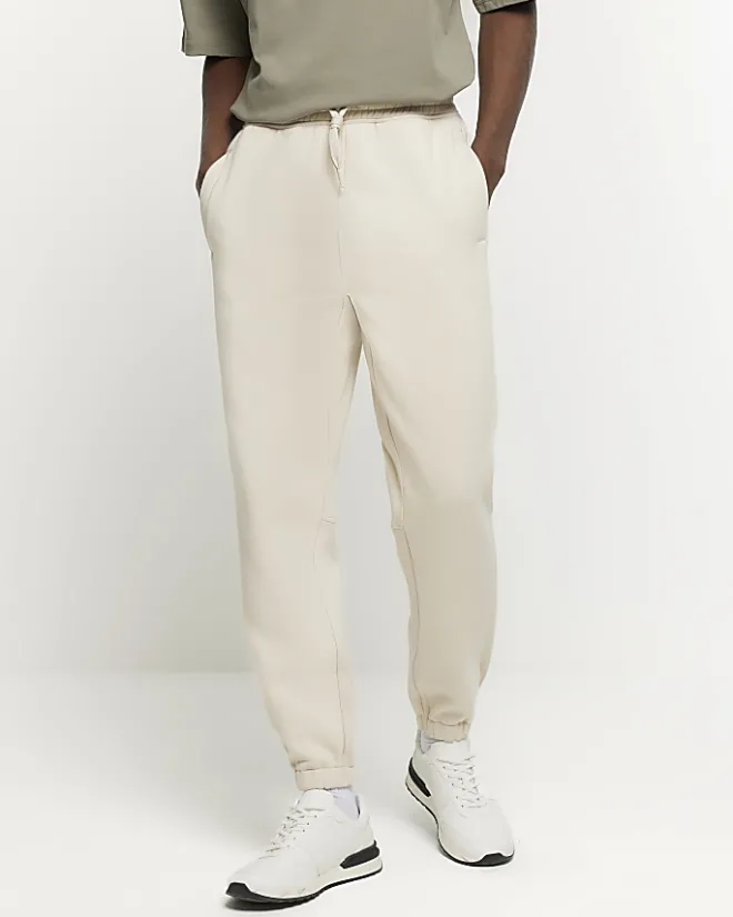River Island Ecru regular fit rib panel joggers Stone Online