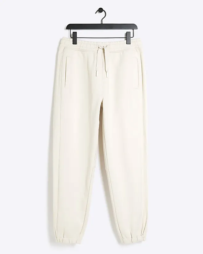River Island Ecru regular fit rib panel joggers Stone Online