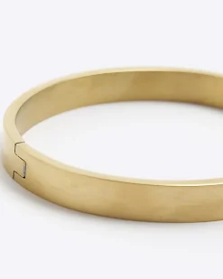 River Island Gold colour stainless steel bangle bracelet Yellow Discount