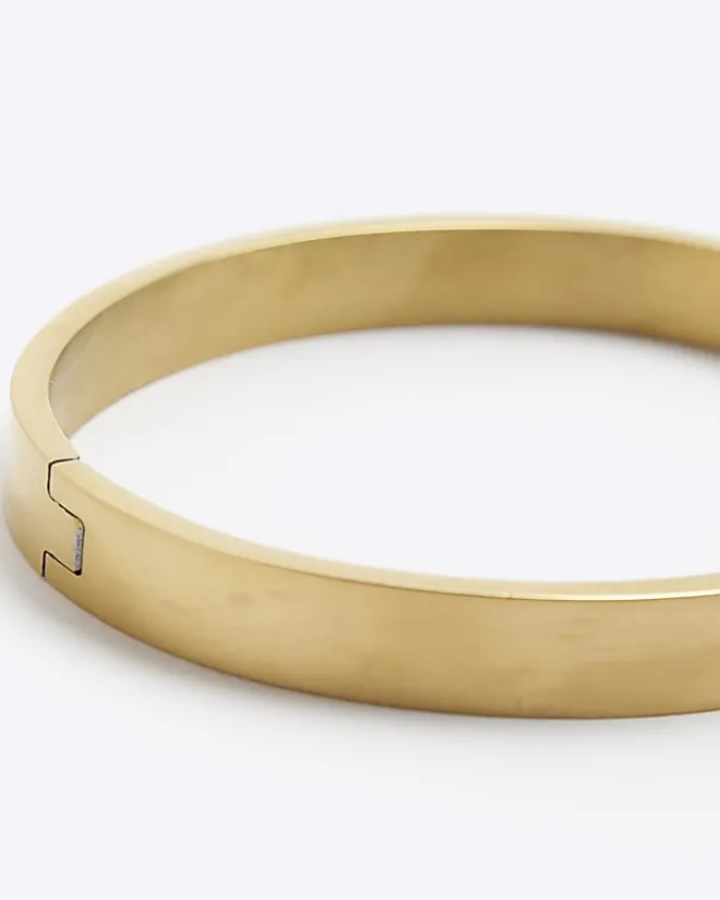 River Island Gold colour stainless steel bangle bracelet Yellow Discount