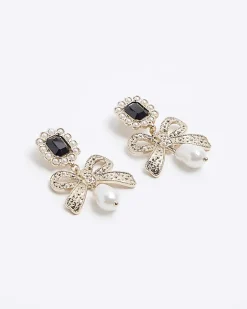 River Island Gold pearl bow drop earrings Yellow Hot