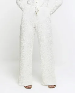 River Island Petite textured wide leg trousers Cream Online