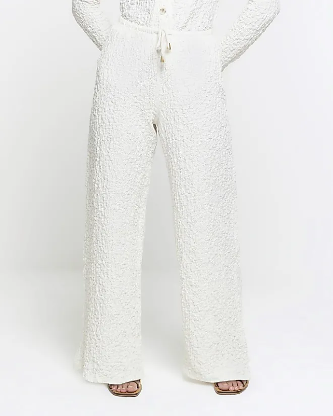 River Island Petite textured wide leg trousers Cream Online