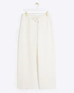 River Island Petite textured wide leg trousers Cream Online