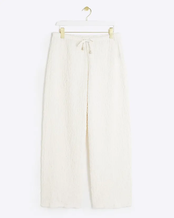 River Island Petite textured wide leg trousers Cream Online