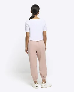River Island Petite lyocell cuffed joggers Pink Clearance