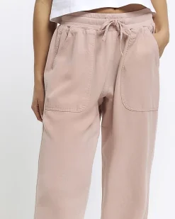 River Island Petite lyocell cuffed joggers Pink Clearance