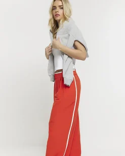 River Island Petite side stripe wide leg trousers Red Hot