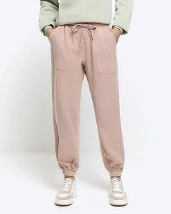 River Island lyocell cuffed joggers Pink Sale