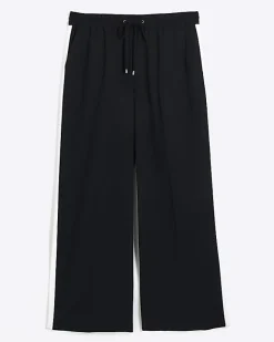 River Island Plus side stripe wide leg joggers Black Outlet