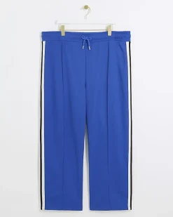 River Island Plus side stripe wide leg joggers Blue Fashion