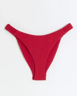 River Island crinkle bikini bottoms Red Online