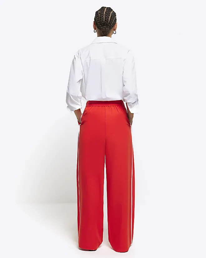 River Island side stripe wide leg trousers Red Outlet