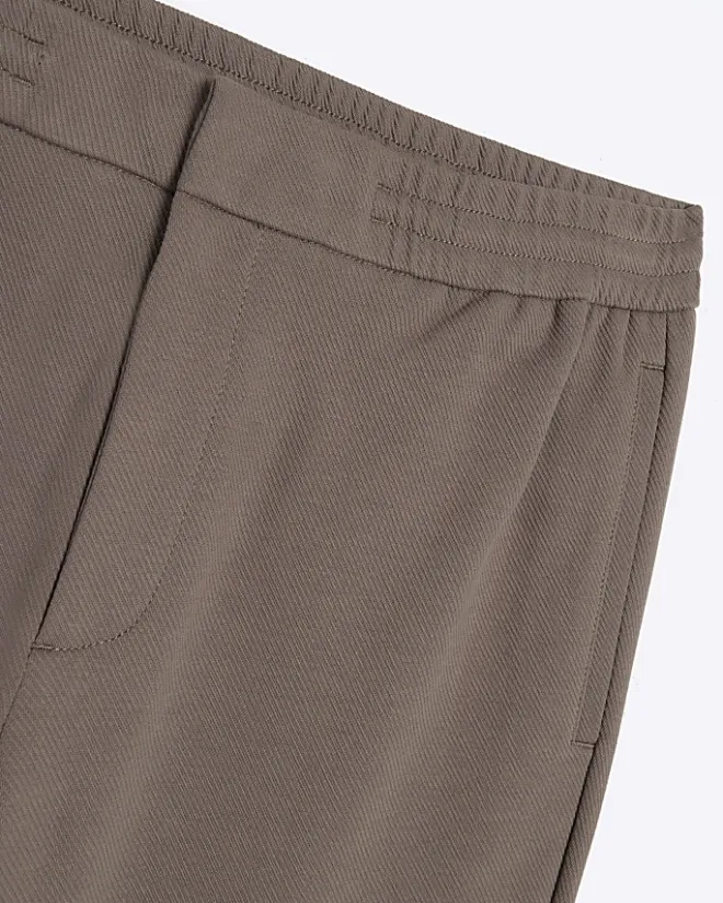 River Island slim fit twill pull on smart joggers Stone Online