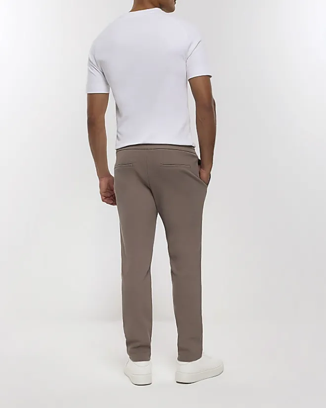 River Island slim fit twill pull on smart joggers Stone Online